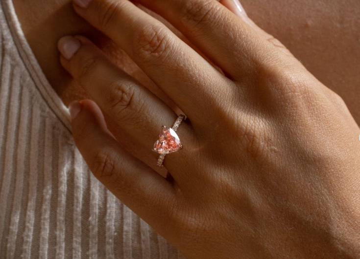 Why A Pink Diamond On A Gold Ring Is Jewelry’s Finest Combination